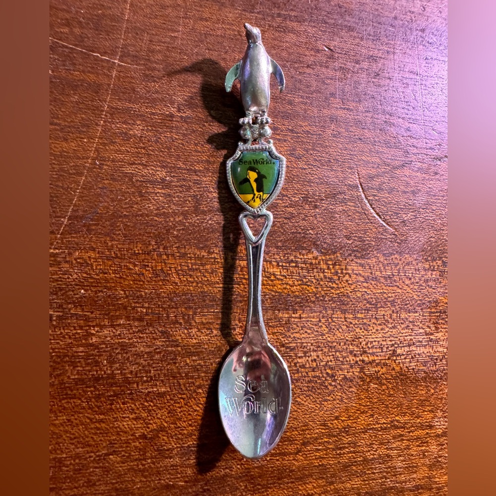 SeaWorld with penguin topper collectible spoon